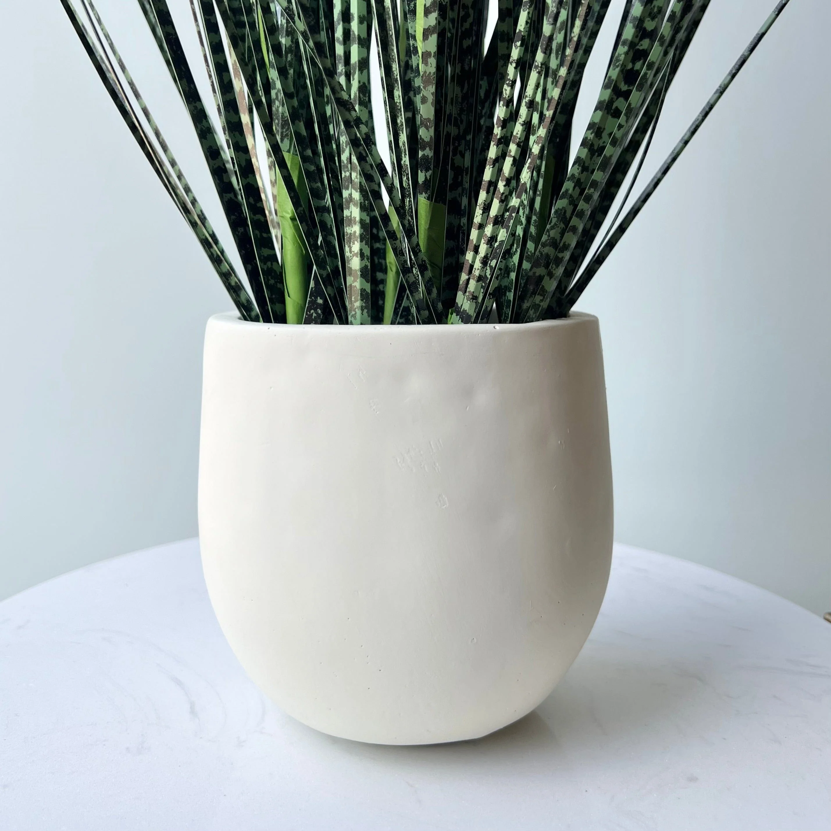Artificial Mottled Onion Grass in Stone-look Planter - Image 4